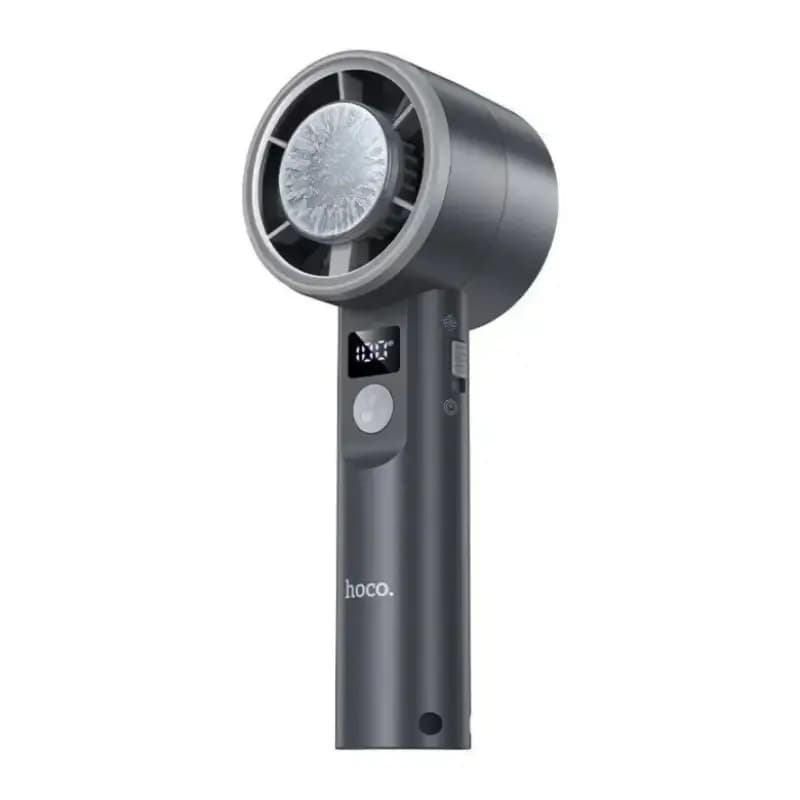 Person using Hoco HX612 handheld fan outdoors